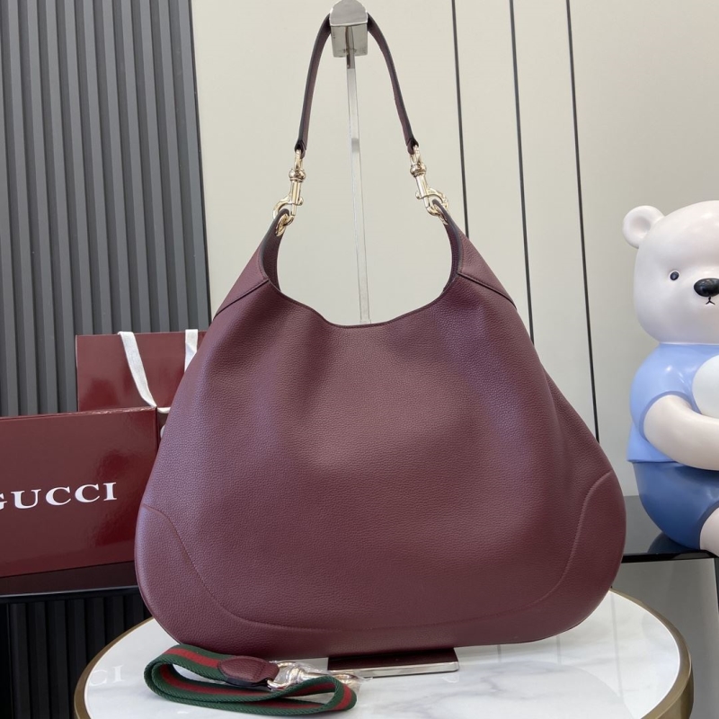 G*u*i top handle bags